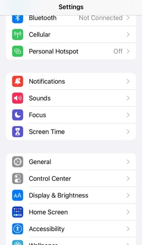 select Display and Brightness | Make Apple Music Dark Mode